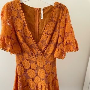 Hellomolly orange, size AU 6 US xs, ruffles at the sleeves and bottom